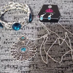 Paparazzi Silver Necklace with Earrings And Stretch Bracelet With Blue Accents.
